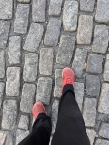 Feet walking on cobblestones representing neurodivergent calming strategies