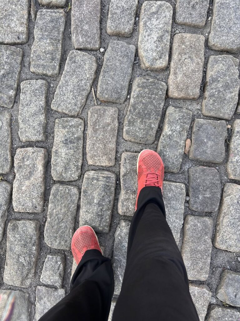 Feet walking on cobblestones representing neurodivergent calming strategies